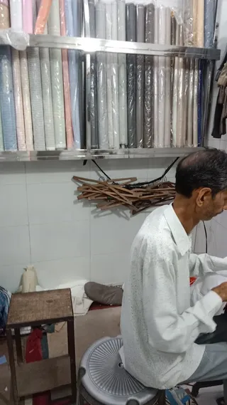 TOP IN TOWN TAILORS & DRAPPERS — photo 1