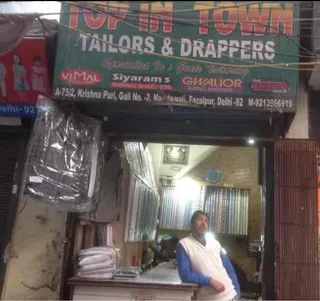 TOP IN TOWN TAILORS & DRAPPERS — photo 2