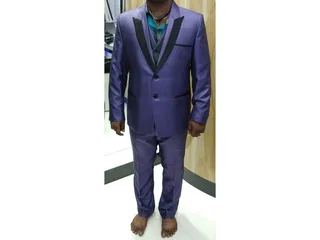 ROMAN'S Textiles Tailoring SUITS, BLAZERS & SAFARI SPECIALIST — photo 1