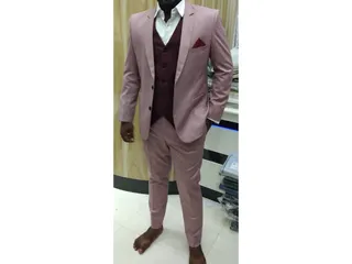 ROMAN'S Textiles Tailoring SUITS, BLAZERS & SAFARI SPECIALIST — work photo 4