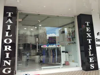 ROMAN'S Textiles Tailoring SUITS, BLAZERS & SAFARI SPECIALIST — work photo 5