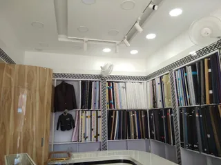 ROMAN'S Textiles Tailoring SUITS, BLAZERS & SAFARI SPECIALIST — work photo 6