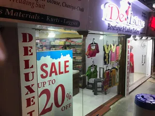 Deluxe Boutique & Ladies Tailors — work photo 5