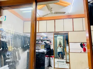 Supreme Mens Wear — work photo 1