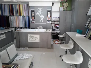 Unique Selection - Cloth Store | Bespoke Tailored | Formal Pant-Shirt |suit | Blazer | West cot | Sherwani | Tailoring — work photo 4