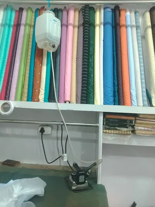 Khan tailoring & cloth store — work photo 3