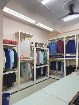 NEW LIGHT BROTHERS - Tailors and Cloth Store — work photo 4