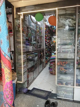 Lucky Tailoring Material and Kaje Center — photo 1
