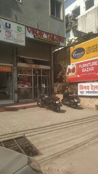 Vinay tailors suit specialist and fabrics — photo 1