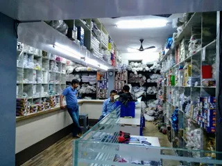 Jabri Brothers tailoring materials — work photo 1