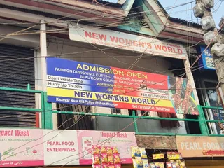 NEW WOMENS WORLD — photo 1