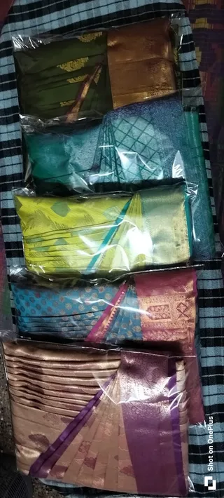 Saree pre-pleating, draping, & Tanjavur painting by Lalitha — work photo 1